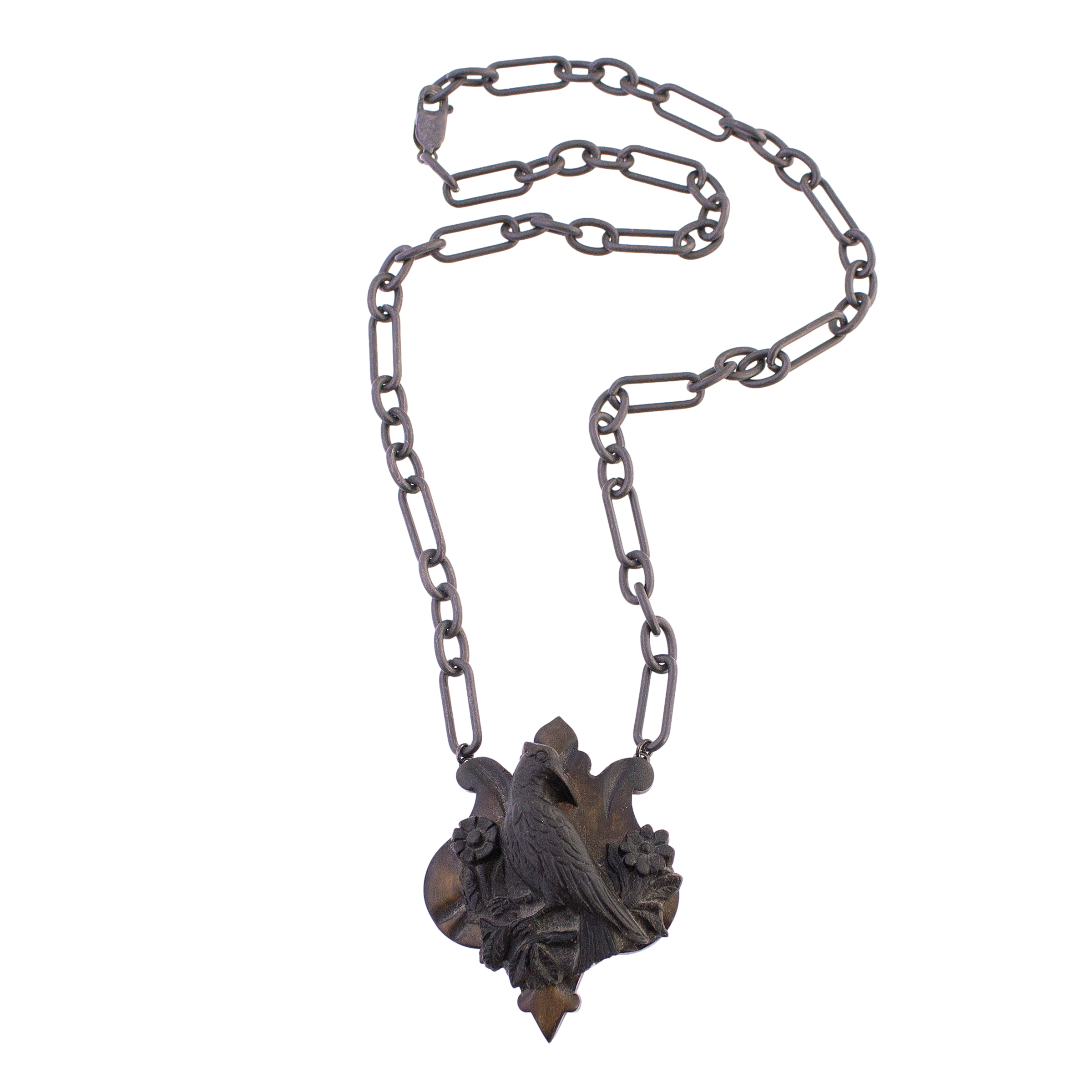 Gutta Percha Bird Pendant on Sterling Chain