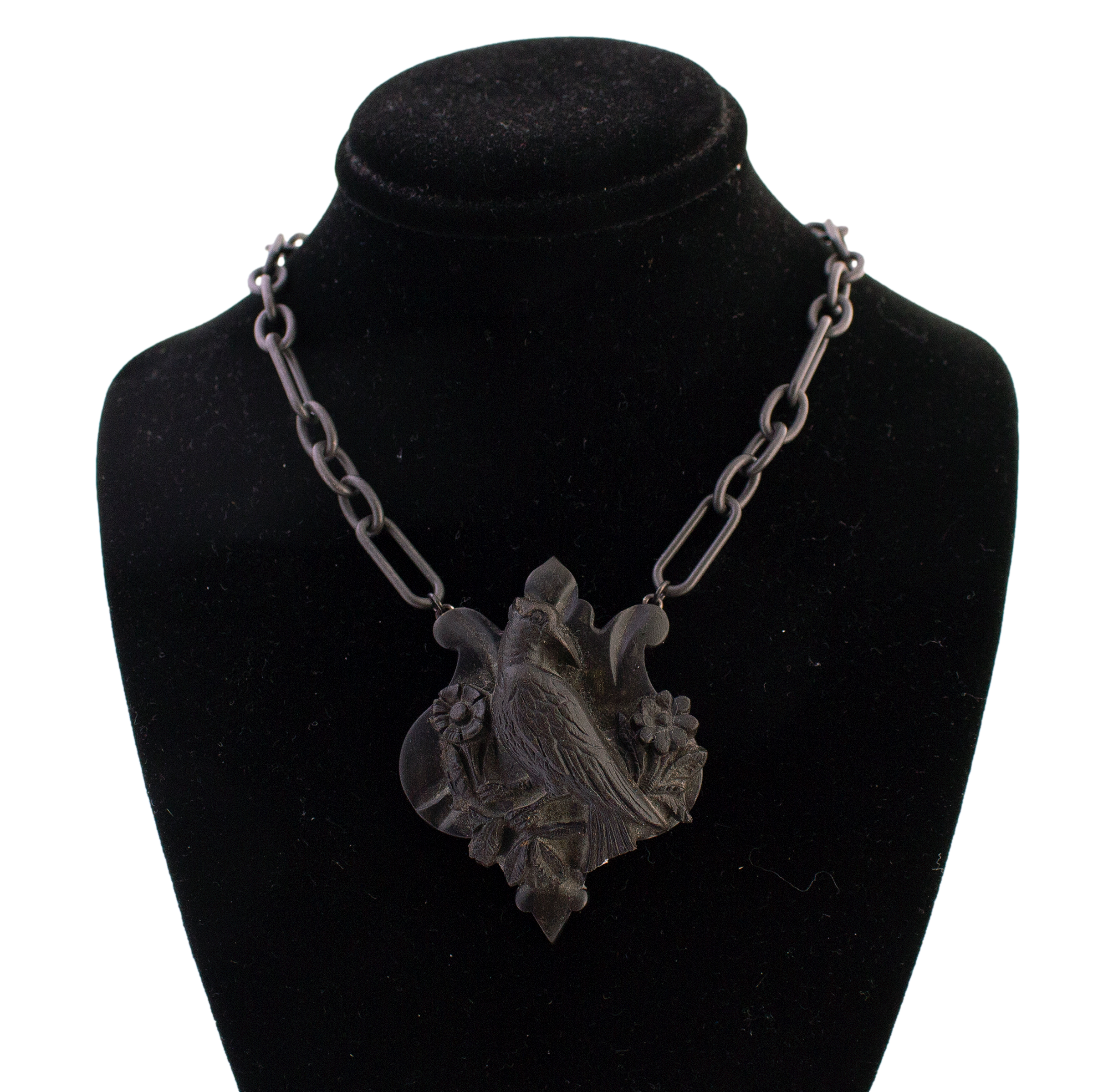 Gutta Percha Bird Pendant on Sterling Chain